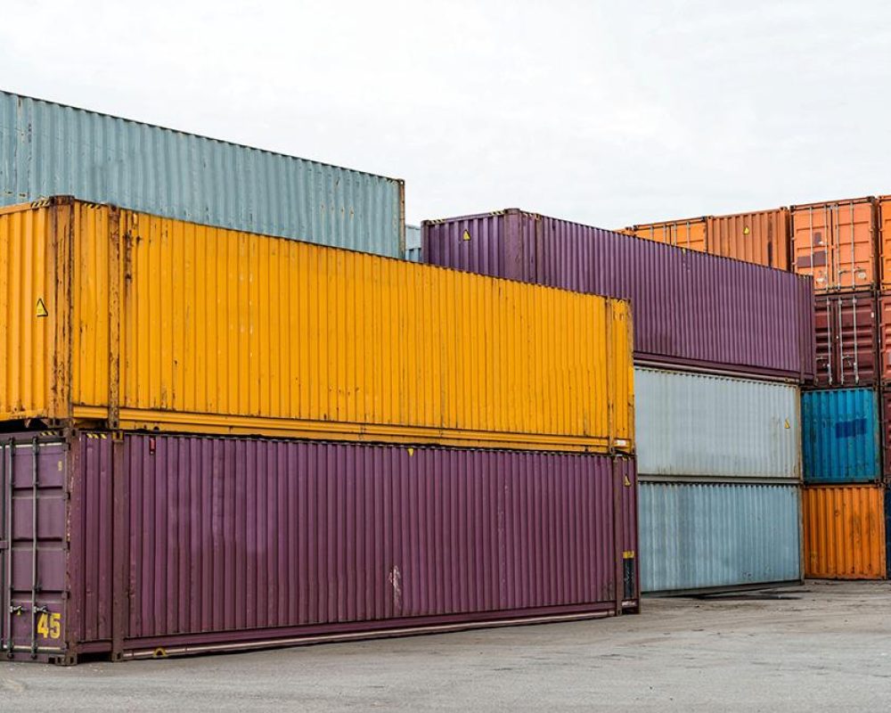 some-container-stacking-in-freight-yard-transport-2021-08-30-07-14-48-utc